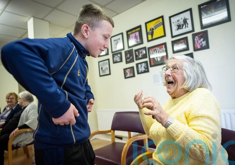 Dance project brings together school pupils and elderly people in Belfast