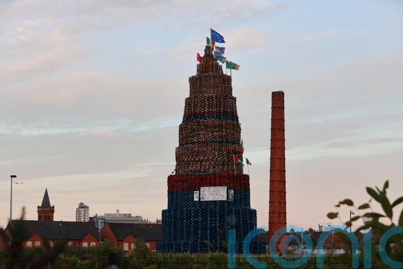 Politicians’ election posters appear on loyalist bonfires