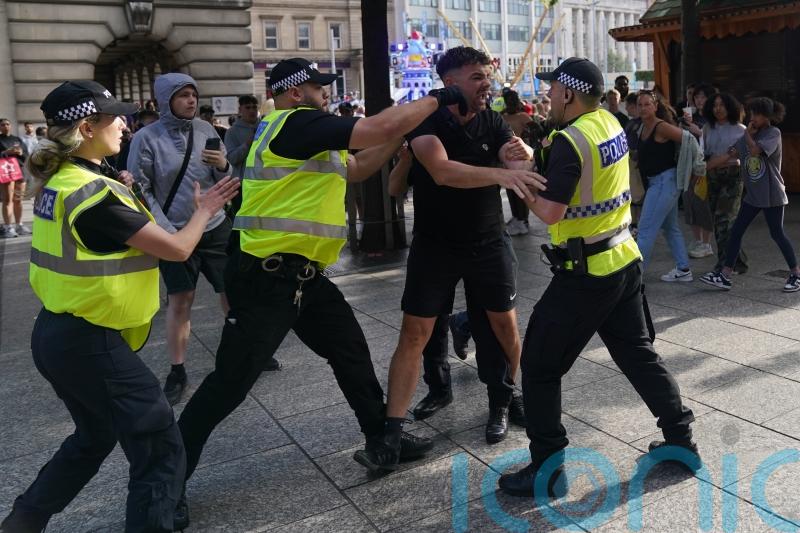 Dozens arrested as disorder continues, with fears of more violence to come