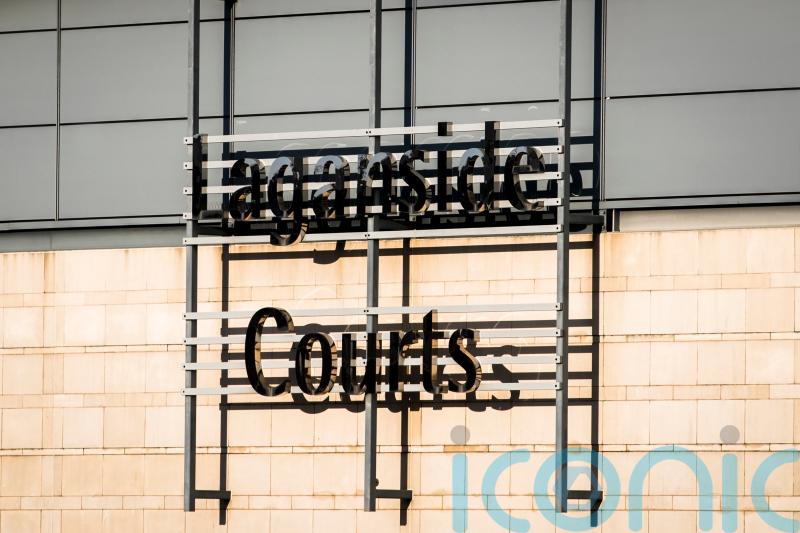 Woman arrested in probe into Belfast disorder