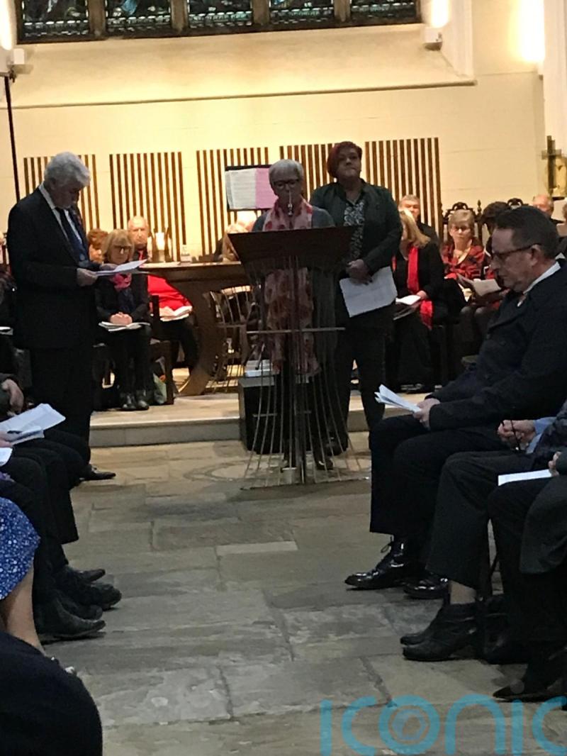 Two murdered police officers recalled at dedication of memorial quilt