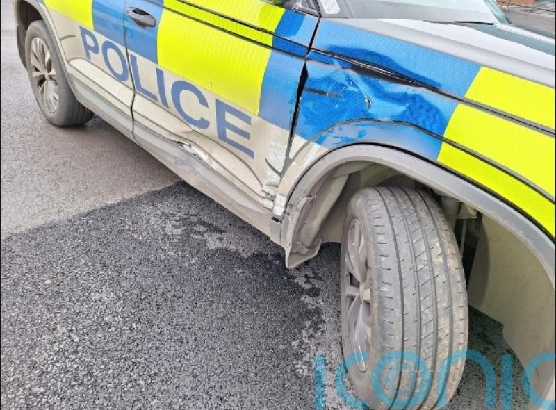 Two police officers injured after car rammed