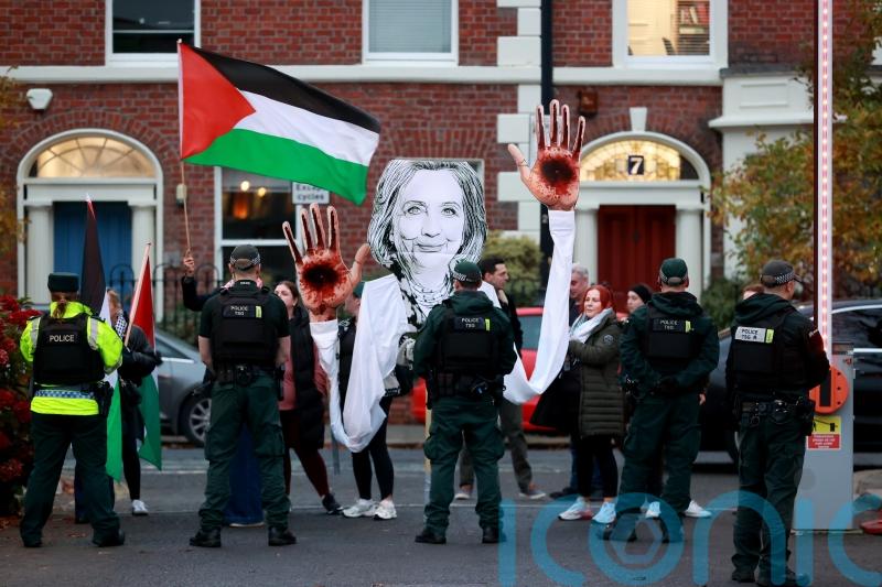 Four arrested after protests during Clinton visit to Queen&rsquo;s University