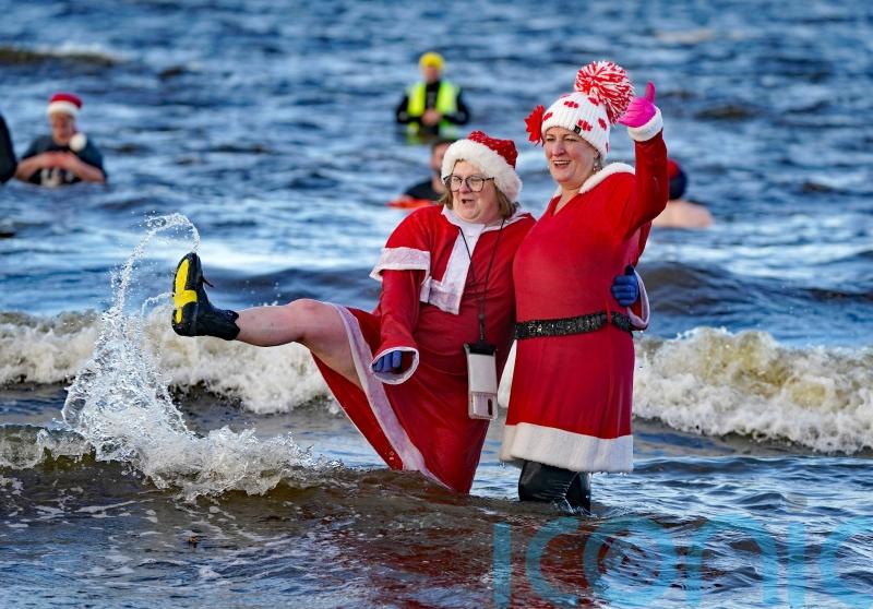 Grey and mild conditions forecast as walkers and swimmers head out on Boxing Day