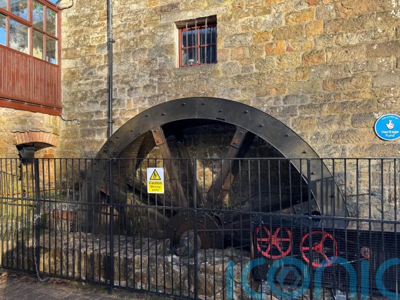 Water wheel starts turning again to power restaurant at historic mill