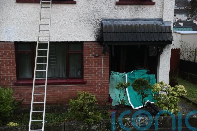 Police officers hailed after rescuing adults and children from burning house