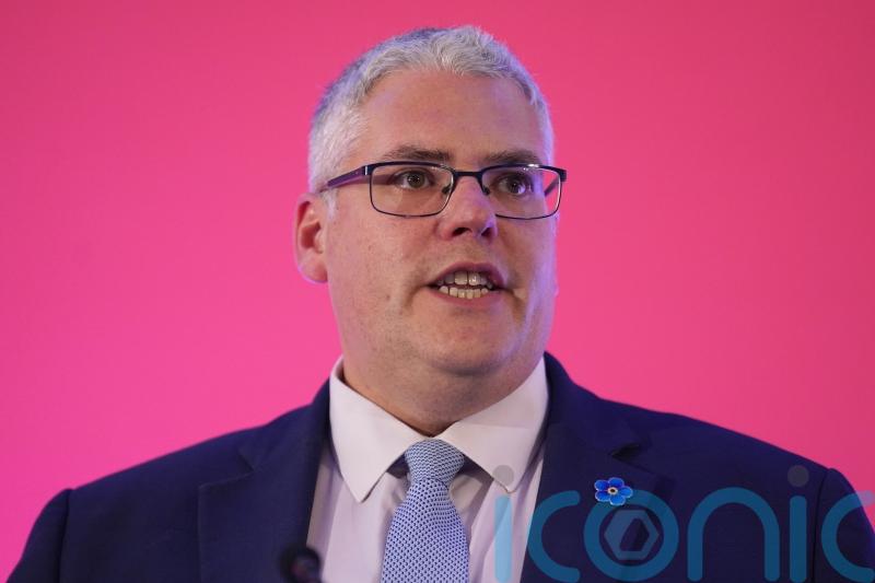 Investigation after masked protesters disrupt police meetings in Belfast