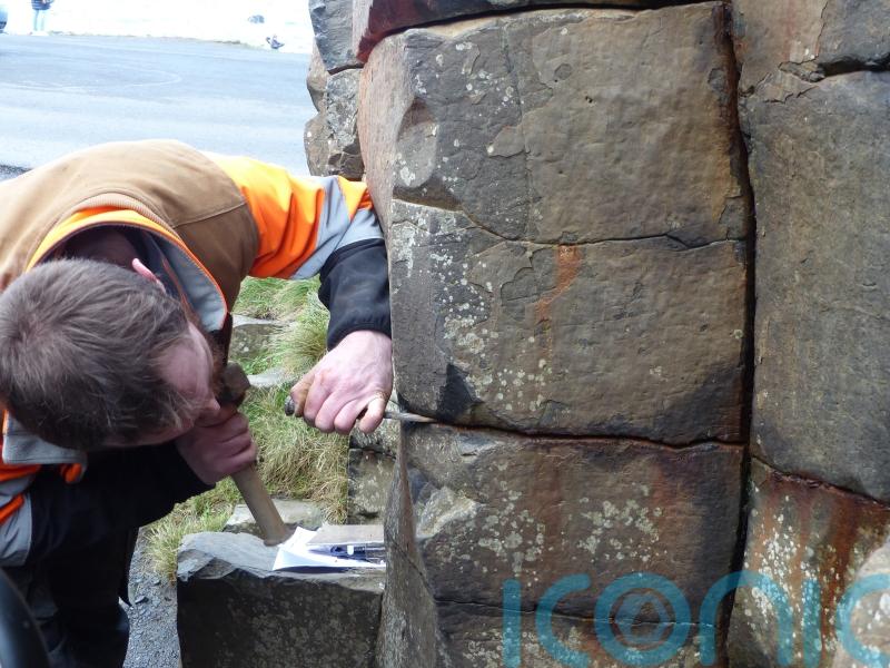 Northern Ireland’s World Heritage Site being damaged by tourists leaving coins