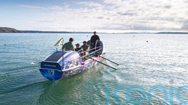 Rowers raising funds for charity stop in Northern Ireland to shelter from storm