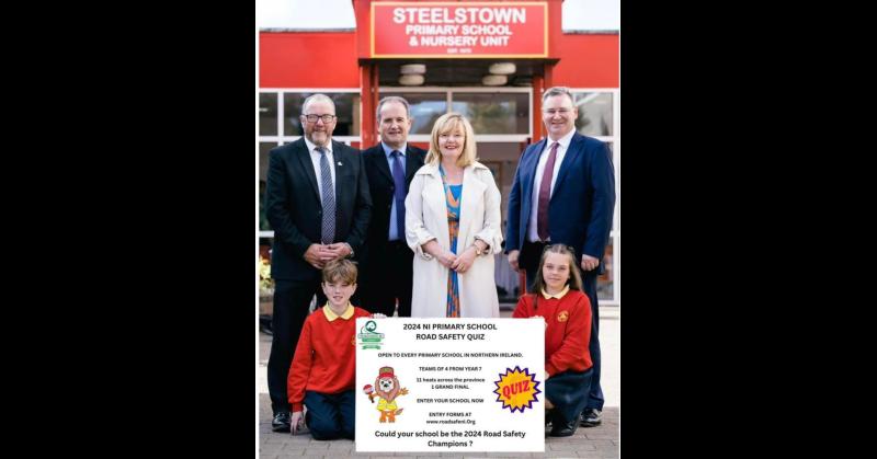  pictured along with pupils from the school are Davy Jackson Chair Road Safe NI, Peter Melarkey Road Safe NI Mrs Siobhan Gillen school Principal Jonathan McKeown from sponsor’s CRASH Services.    