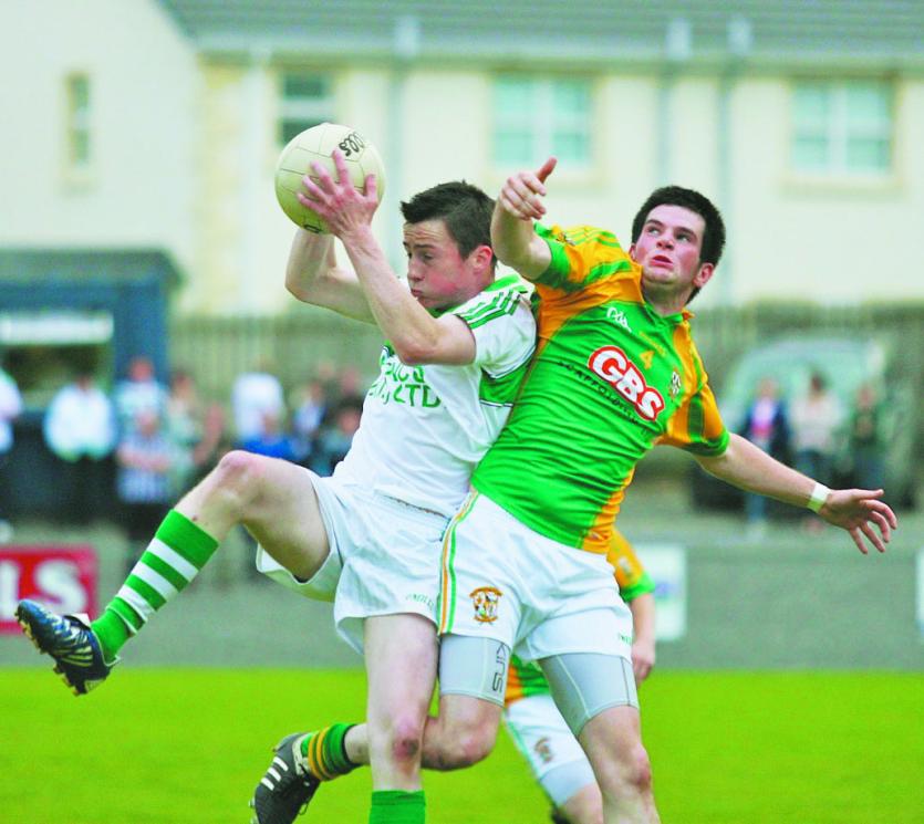 Jude McLaughlin beat John Duffy to the high ball during Craigbane's 2010 win over Foreglen (Pic: Dessie Loughery)