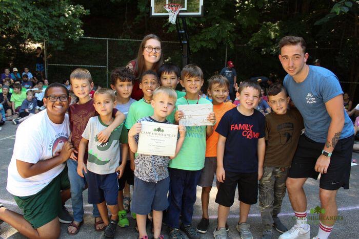 Calvin and other coaches with some of the kids at camp.
