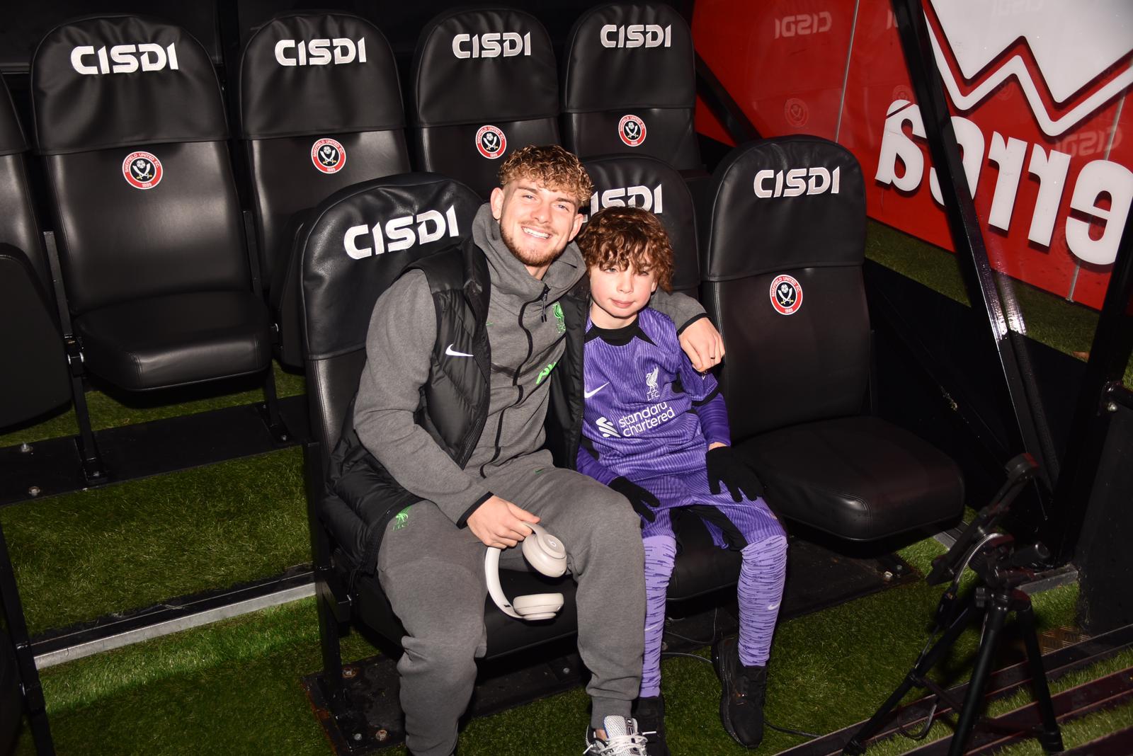 Adam and Harvey Elliot having a chat before the game