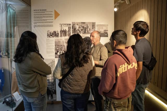 A delegation of indigenous activists attending the Bloody Sunday Trust’s Derry Peace and Conflict International and its Developing International Solidarity programme being taken on a tour of the Museum of Free Derry by Tony Doherty, Chair of the BST.