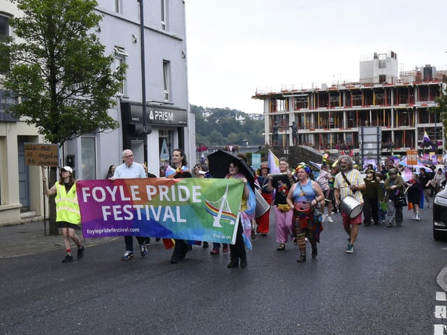 The parade makes its way up Carlisle Road.