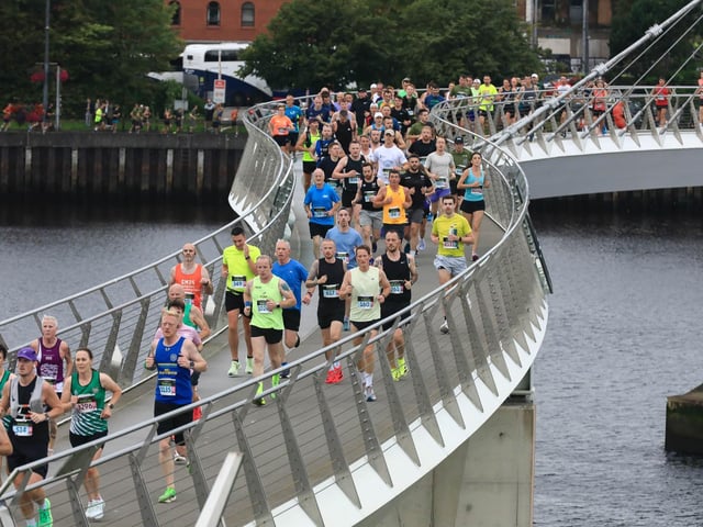 Runners crossing the Peace Bridge in the Waterside Half Marathon on Sunday morning. (Photo - Tom Heaney, nwpresspics)