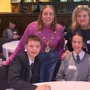 Councillor Grace Uí Niallais, Mayor of Derry City and Strabane District Council; Oskar Blake (Lumen Christi College); Erin McGinley (Thornhill College); Lucie Hyndman (St Cecilia’s College); and Mary Blake, Vice Chair of the Board of Governors, St Columba’s Primary School.