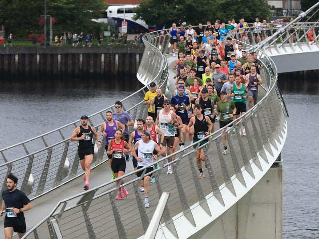 Runners crossing the Peace Bridge in the Waterside Half Marathon on Sunday morning. (Photo - Tom Heaney, nwpresspics)