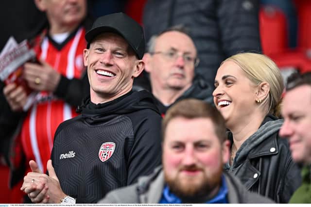 HAPPIER TIMES . . . Ex-Republic of Ireland international James McClean, and his wife Erin, during a Derry City game at The Ryan McBride Brandywell Stadium in Derry. Photo by Ramsey Cardy/Sportsfile