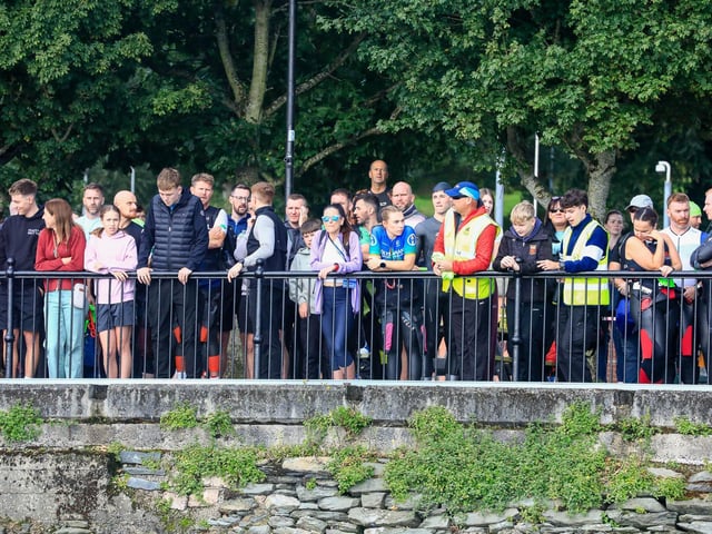 Spectators line the docks as the Europe Triathlon Cup Junior Men race gets on its way in the River Foyle on Saturday morning. (Photo - Tom Heaney, nwpresspics)
