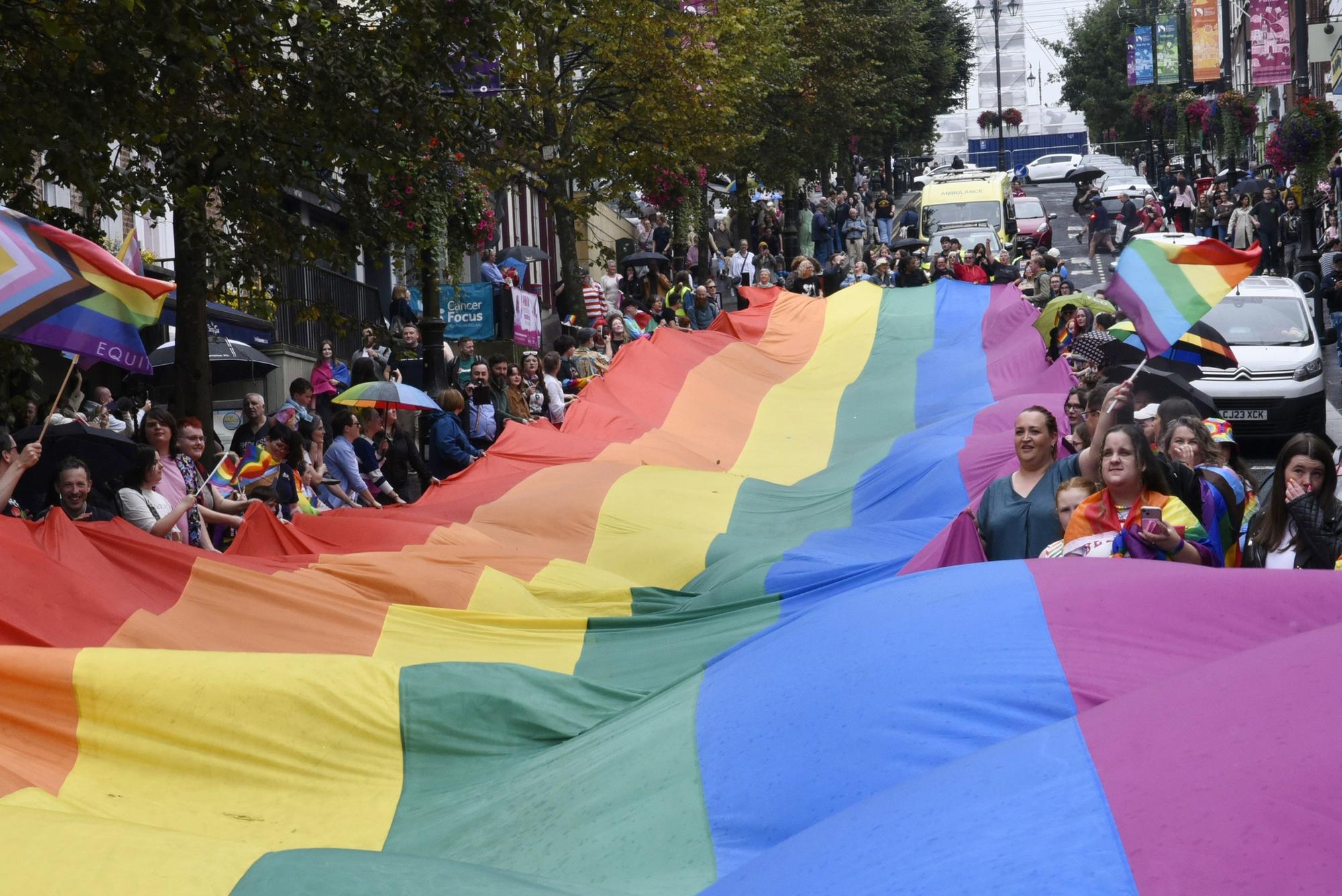 The Foyle Pride Parade coming down Shipquay Street.