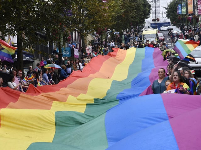 The Foyle Pride Parade coming down Shipquay Street.
