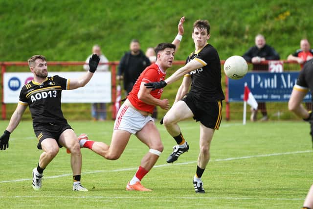 Paul Clifford scores  the opening goal for Sean Dolan's during Saturday's match against Doire Colmcille.