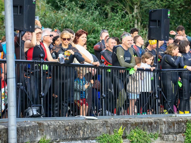Spectators line the docks as the Europe Triathlon Cup Junior Men race gets on its way in the River Foyle on Saturday morning. (Photo - Tom Heaney, nwpresspics)