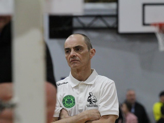 Oak Leaf ABC coach Eugene 'Budge' O'Kane watches the action from ringside.