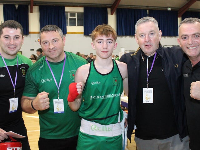 Tyler Keaveney with Raphoe Boxing Club members after his win