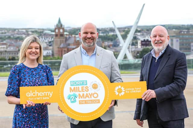 From L-R: Erin McFeely, Director NI, Alchemy Technology Services; Phil Alexander, CEO, Cancer Fund for Children; John Harkin OBE, Founder, Alchemy Technology Services.