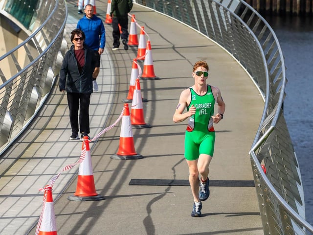Ireland’s Sean Carragher heads across the Peace Bridge towards the finish line in the Europe Triathlon Cup Junior Men’s race on Saturday morning. (Photo - Tom Heaney, nwpresspics)