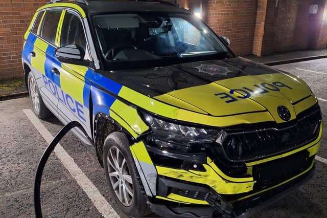 Damaged police vehicle following incident in Derry.